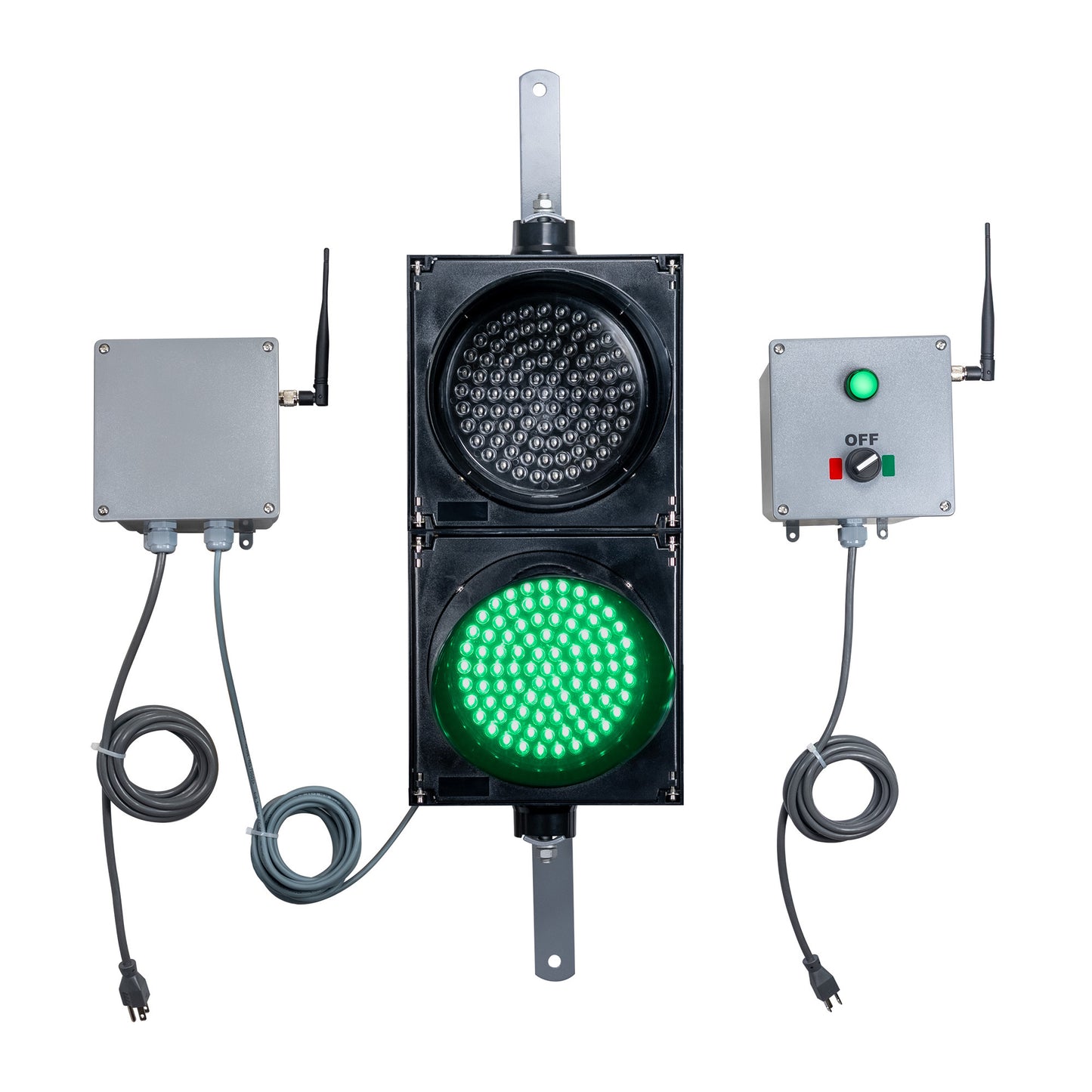 Front perspective of a wireless traffic light system with green LED light on and accompanying control box transmitter with mirrored pilot light and 2-position switch ton a white background.