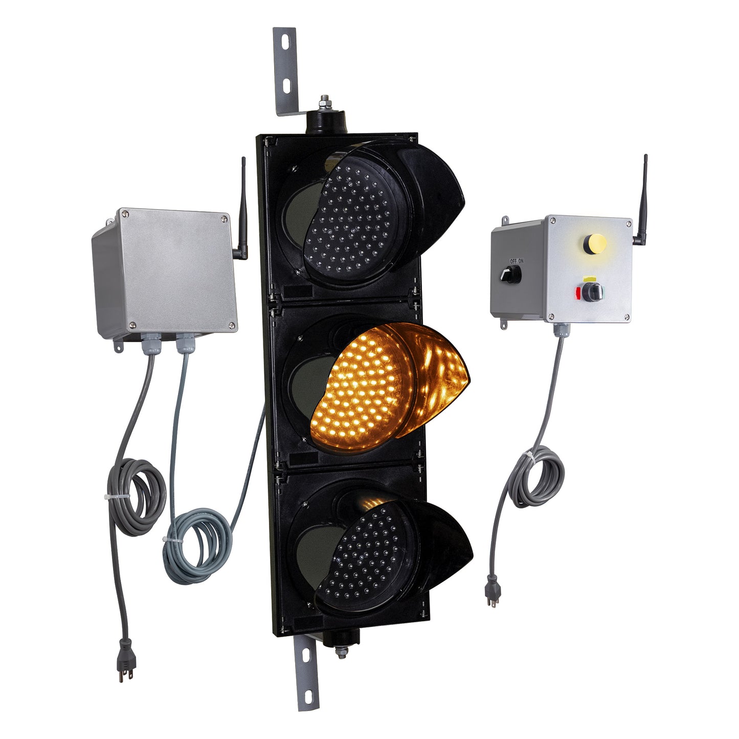 Front perspective of a wireless traffic light system with amber LED light on and accompanying control box transmitter with mirrored pilot light and 3-position switch ton a white background.