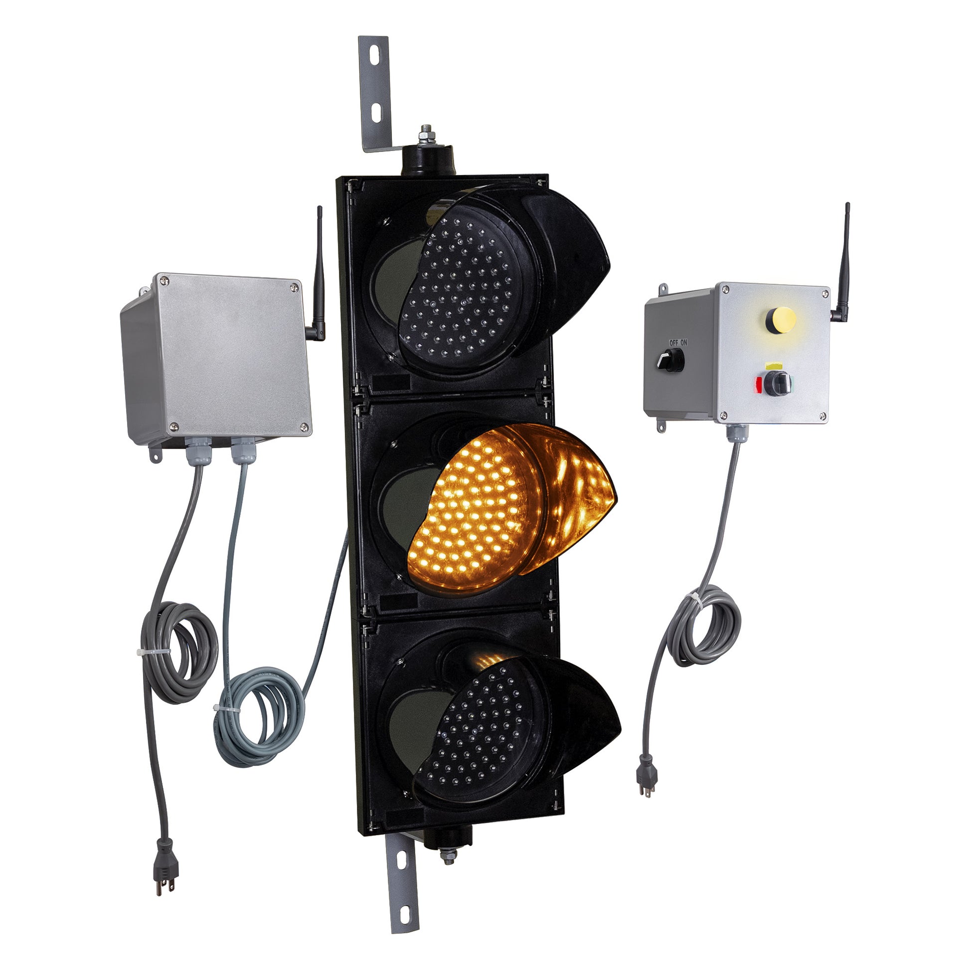 Front perspective of a wireless traffic light system with amber LED light on and accompanying control box transmitter with mirrored pilot light and 3-position switch ton a white background.