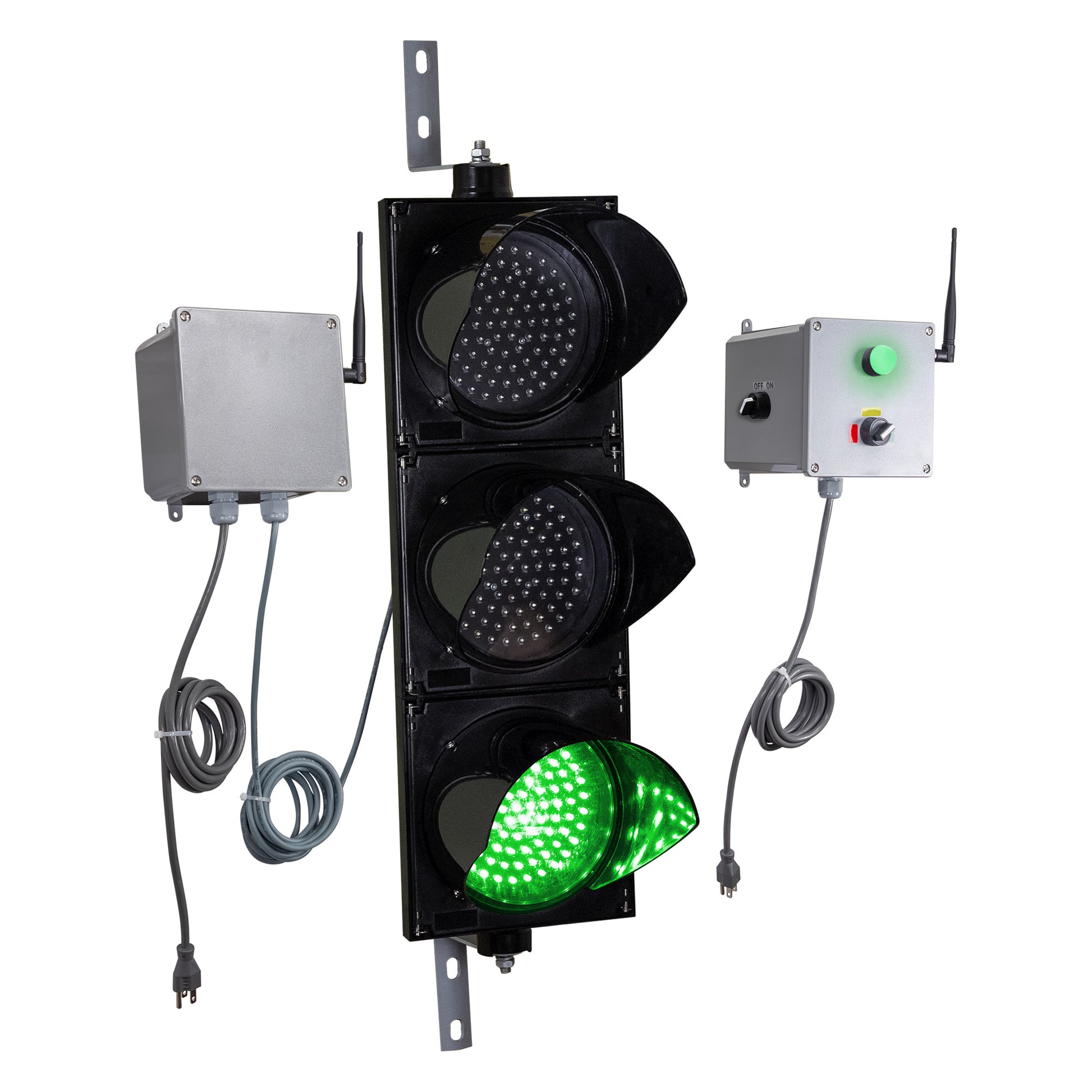 Angled perspective of a wireless traffic light system with green LED light on and accompanying control box transmitter with mirrored pilot light and 3-position switch ton a white background.