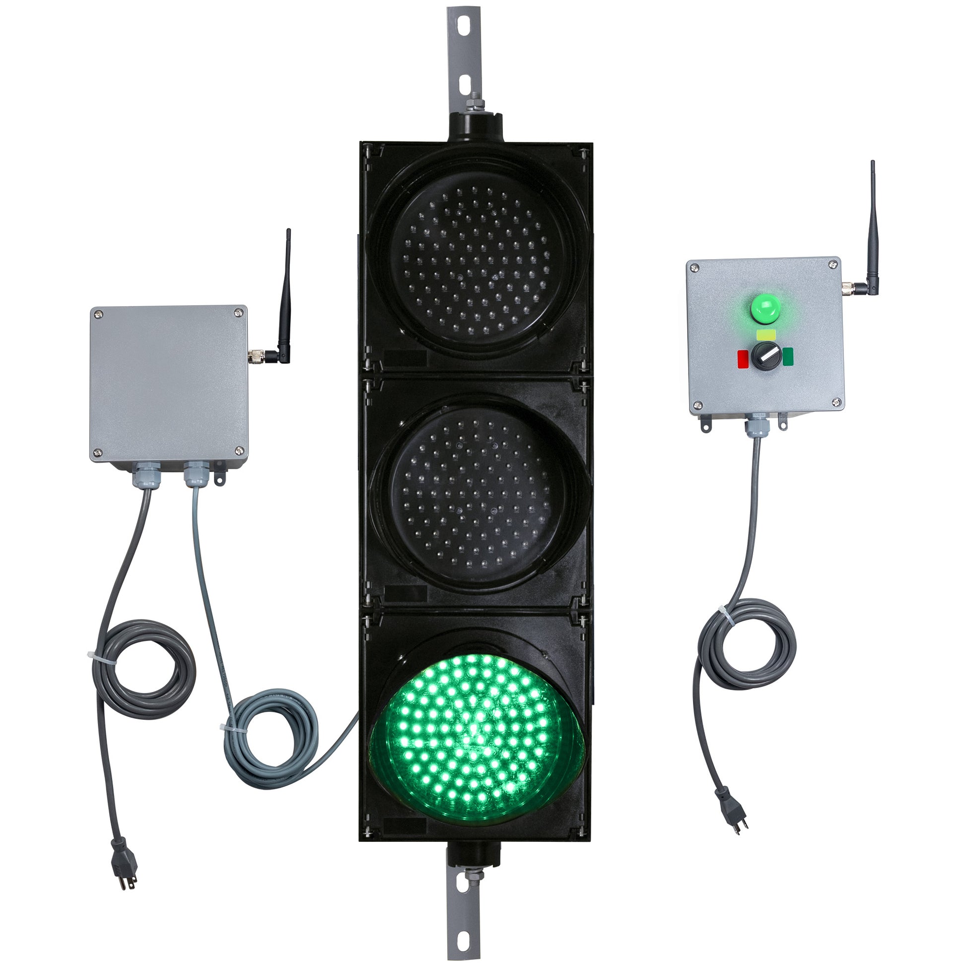 Front perspective of a wireless traffic light system with green LED light on and accompanying control box transmitter with mirrored pilot light and 3-position switch ton a white background.